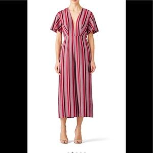 Red striped cotton (100% Cotton). Jumpsuit. Short sleeves.
V-neckline.
